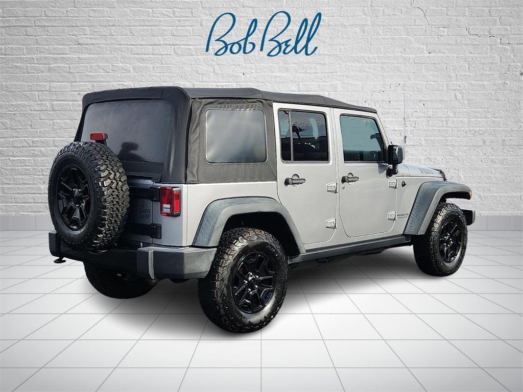 used 2017 Jeep Wrangler Unlimited car, priced at $18,054