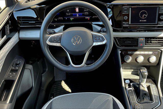 used 2024 Volkswagen Taos car, priced at $22,484