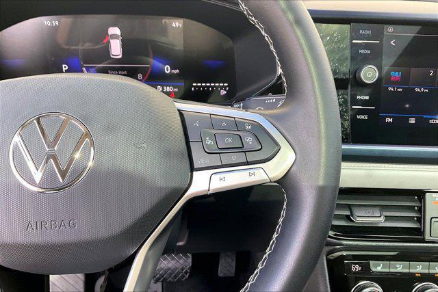 used 2024 Volkswagen Taos car, priced at $24,481