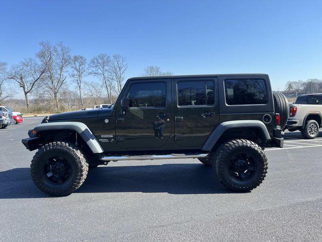 used 2010 Jeep Wrangler Unlimited car, priced at $10,279