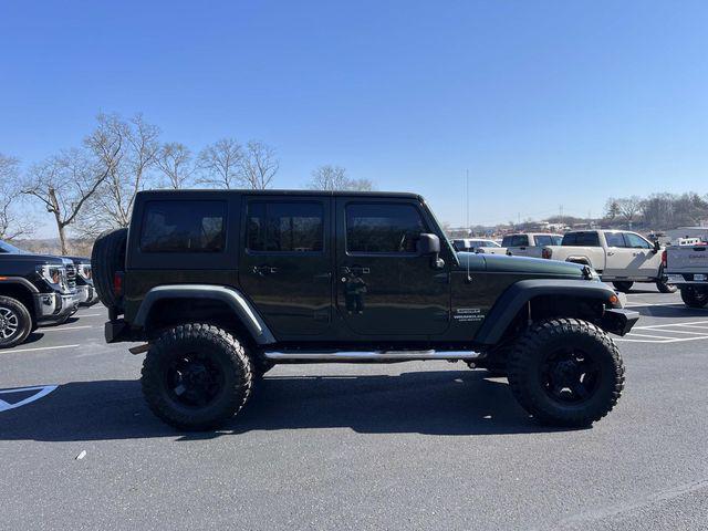 used 2010 Jeep Wrangler Unlimited car, priced at $10,279