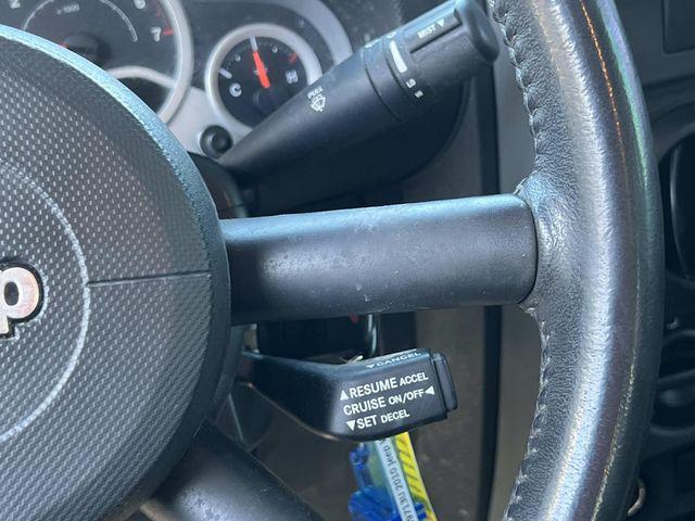 used 2010 Jeep Wrangler Unlimited car, priced at $10,279