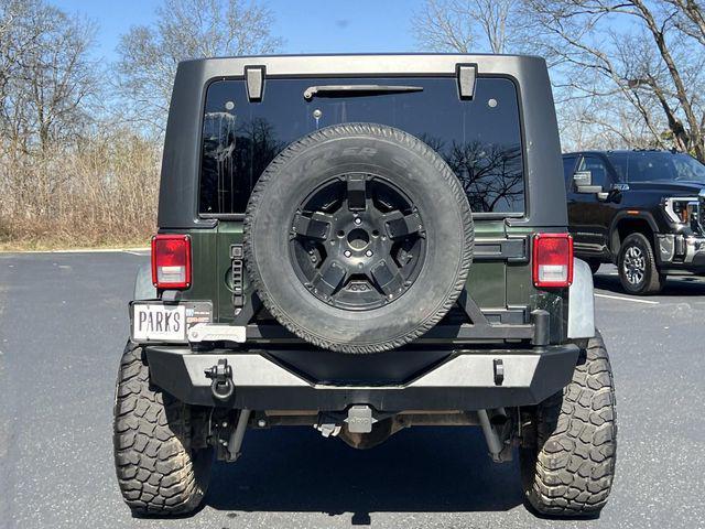 used 2010 Jeep Wrangler Unlimited car, priced at $10,279