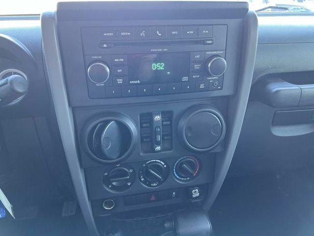 used 2010 Jeep Wrangler Unlimited car, priced at $10,279