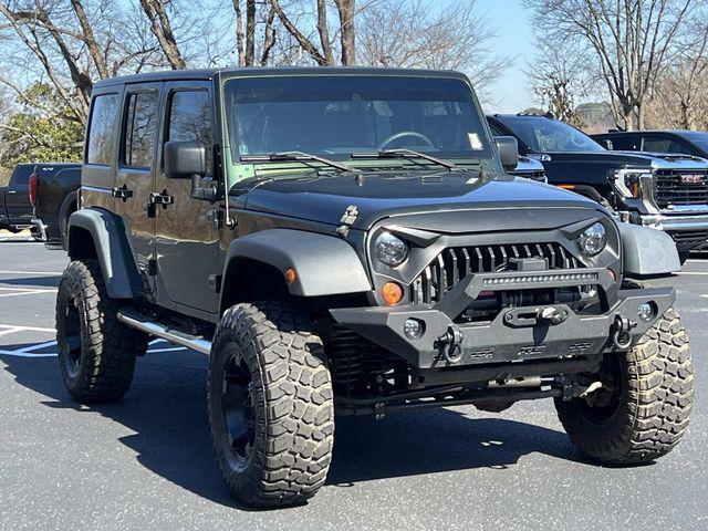 used 2010 Jeep Wrangler Unlimited car, priced at $10,279