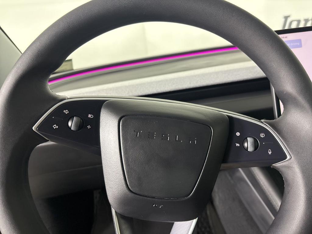 used 2025 Tesla Model 3 car, priced at $34,700