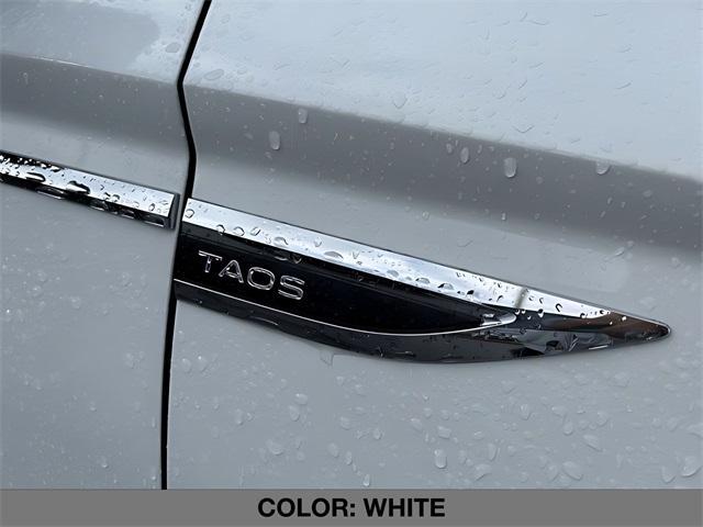 used 2023 Volkswagen Taos car, priced at $19,999