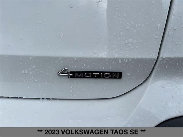 used 2023 Volkswagen Taos car, priced at $19,999