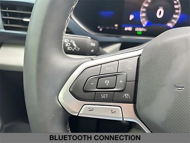 used 2023 Volkswagen Taos car, priced at $19,999