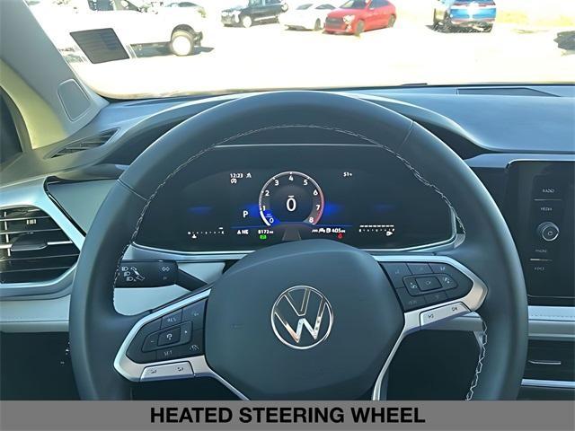 used 2025 Volkswagen Taos car, priced at $25,882
