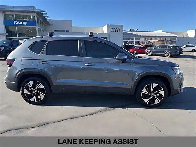 used 2025 Volkswagen Taos car, priced at $25,882