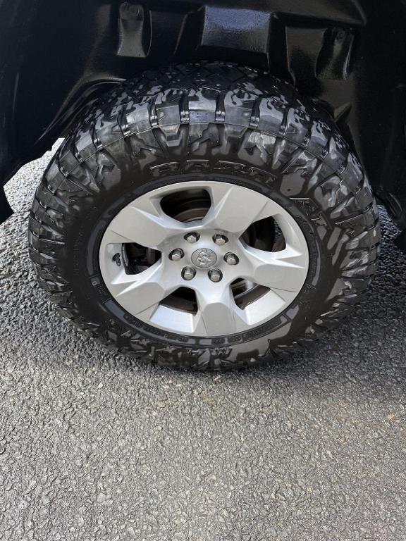 used 2019 Ram 1500 car, priced at $25,000