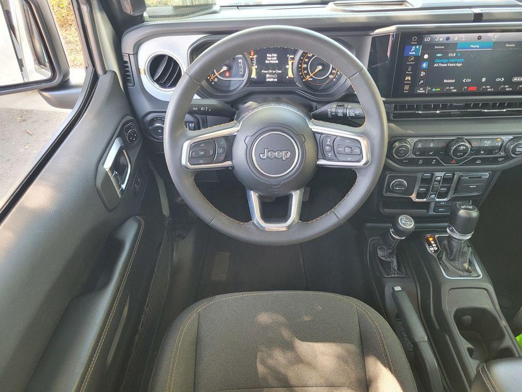 used 2024 Jeep Wrangler car, priced at $33,171
