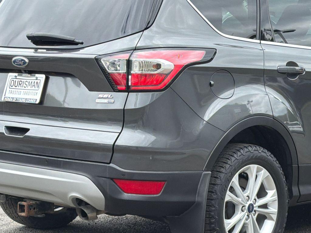 used 2018 Ford Escape car, priced at $13,499