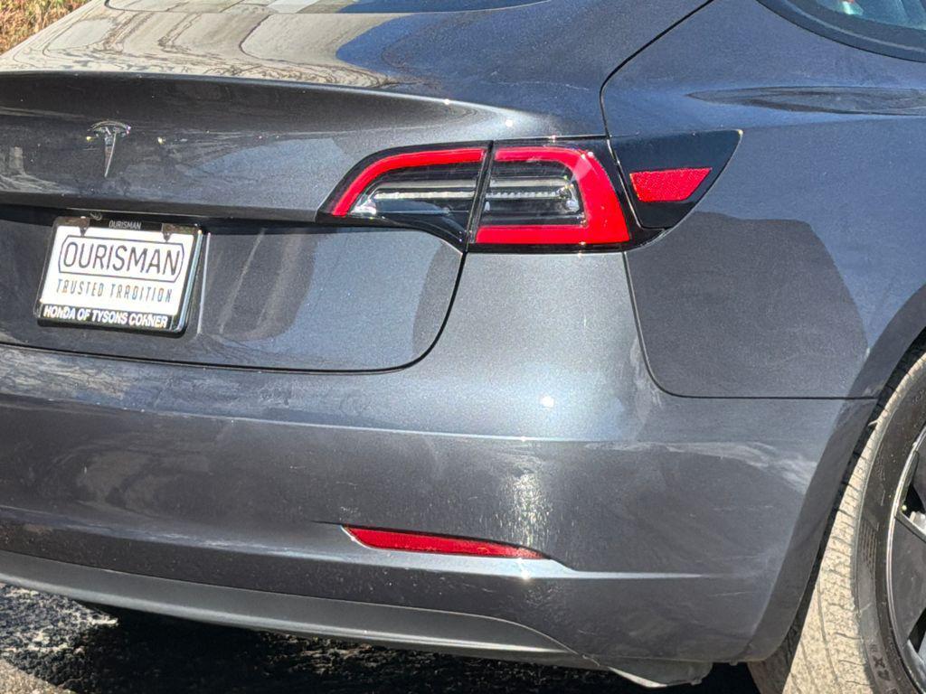 used 2023 Tesla Model 3 car, priced at $18,500