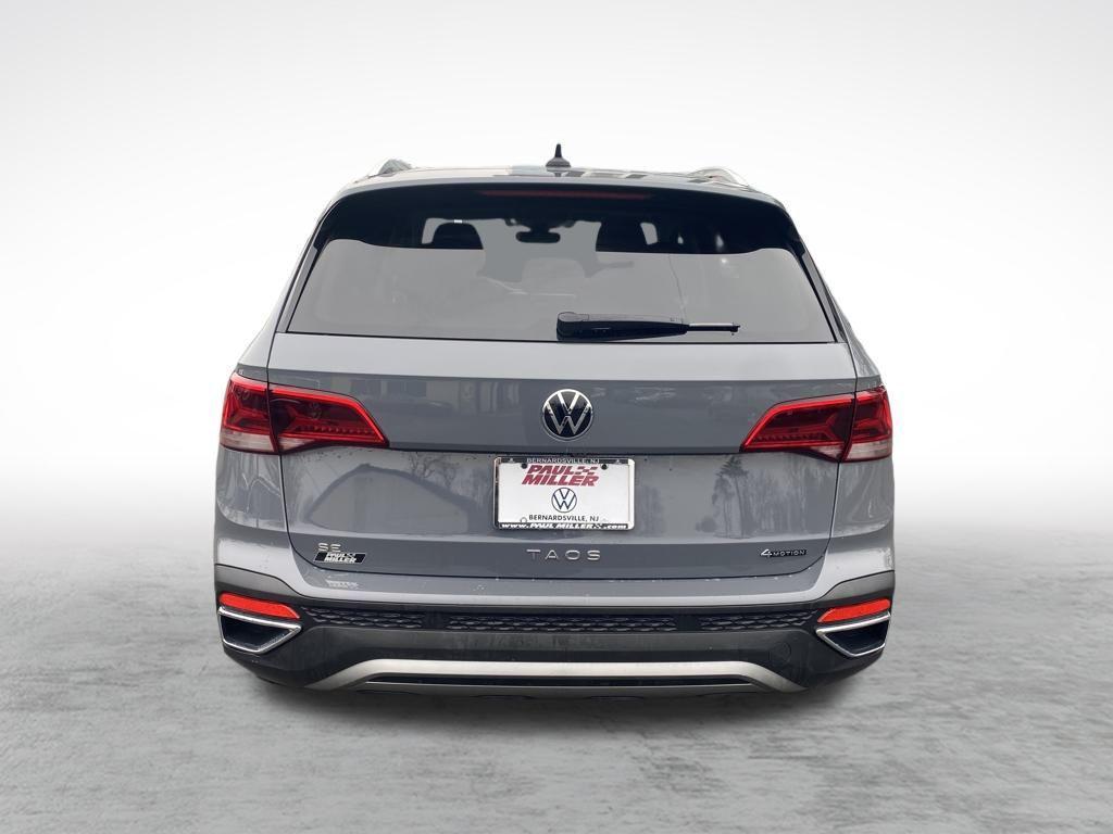 used 2024 Volkswagen Taos car, priced at $22,997