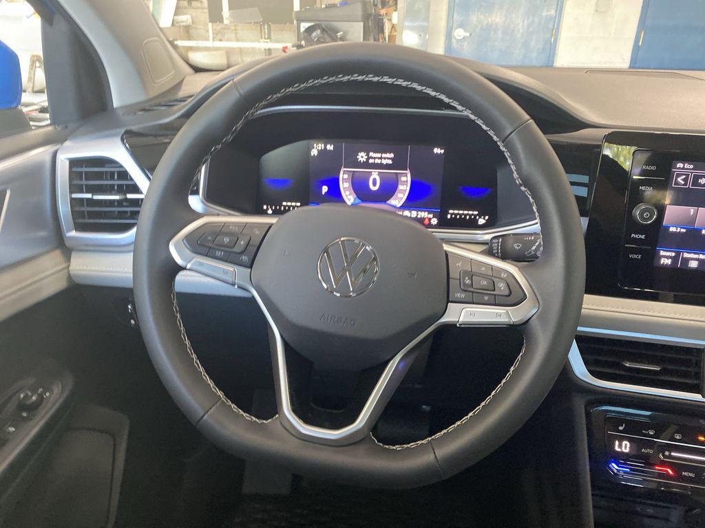 new 2025 Volkswagen Taos car, priced at $33,376