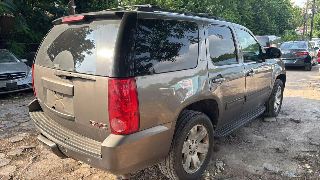 used 2013 GMC Yukon car, priced at $2,950