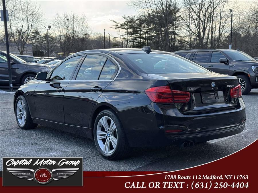 used 2018 BMW 330 car, priced at $12,977