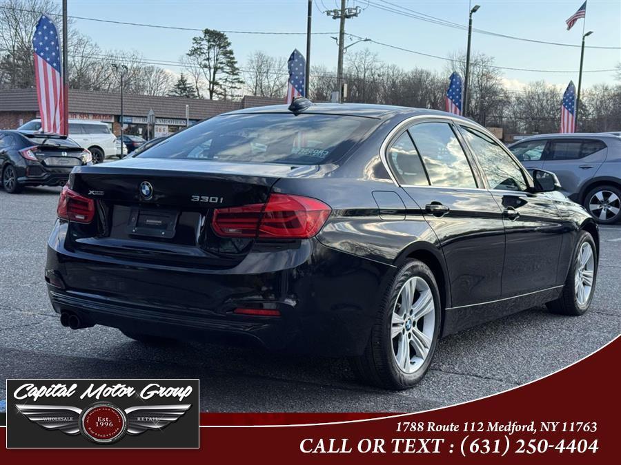 used 2018 BMW 330 car, priced at $12,977
