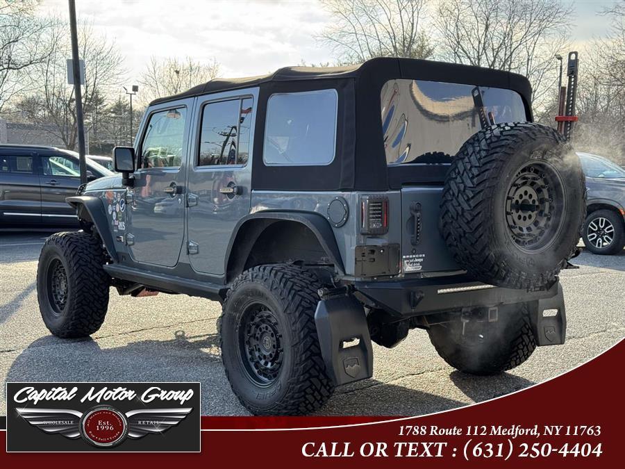 used 2013 Jeep Wrangler Unlimited car, priced at $13,577
