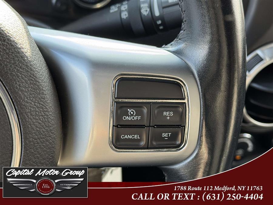 used 2013 Jeep Wrangler Unlimited car, priced at $13,577