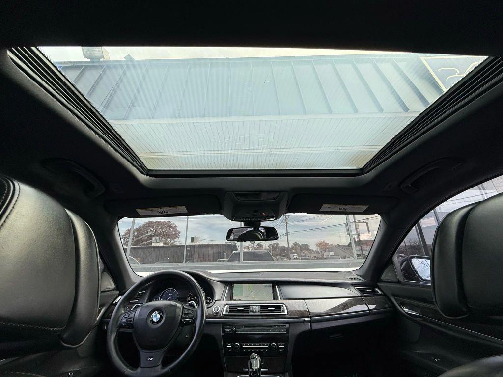 used 2014 BMW 750 car, priced at $13,888