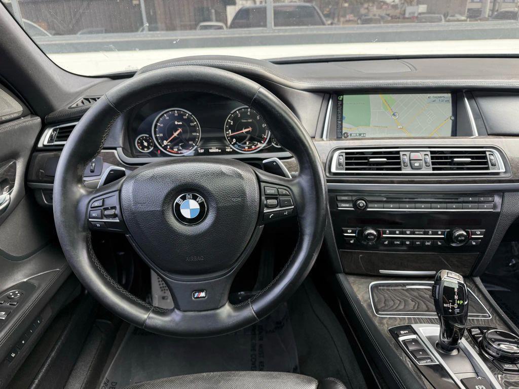used 2014 BMW 750 car, priced at $13,888