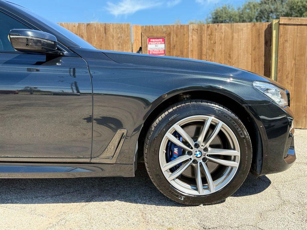 used 2018 BMW 750 car, priced at $23,888