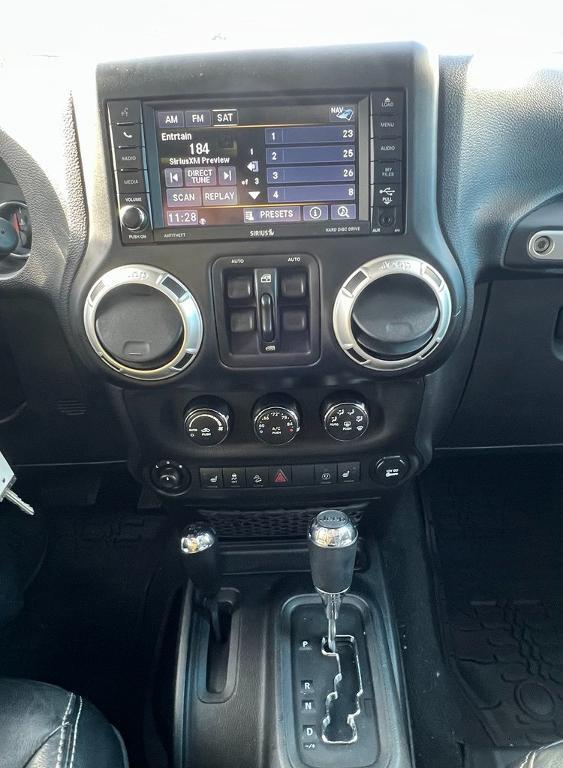 used 2014 Jeep Wrangler Unlimited car, priced at $15,534