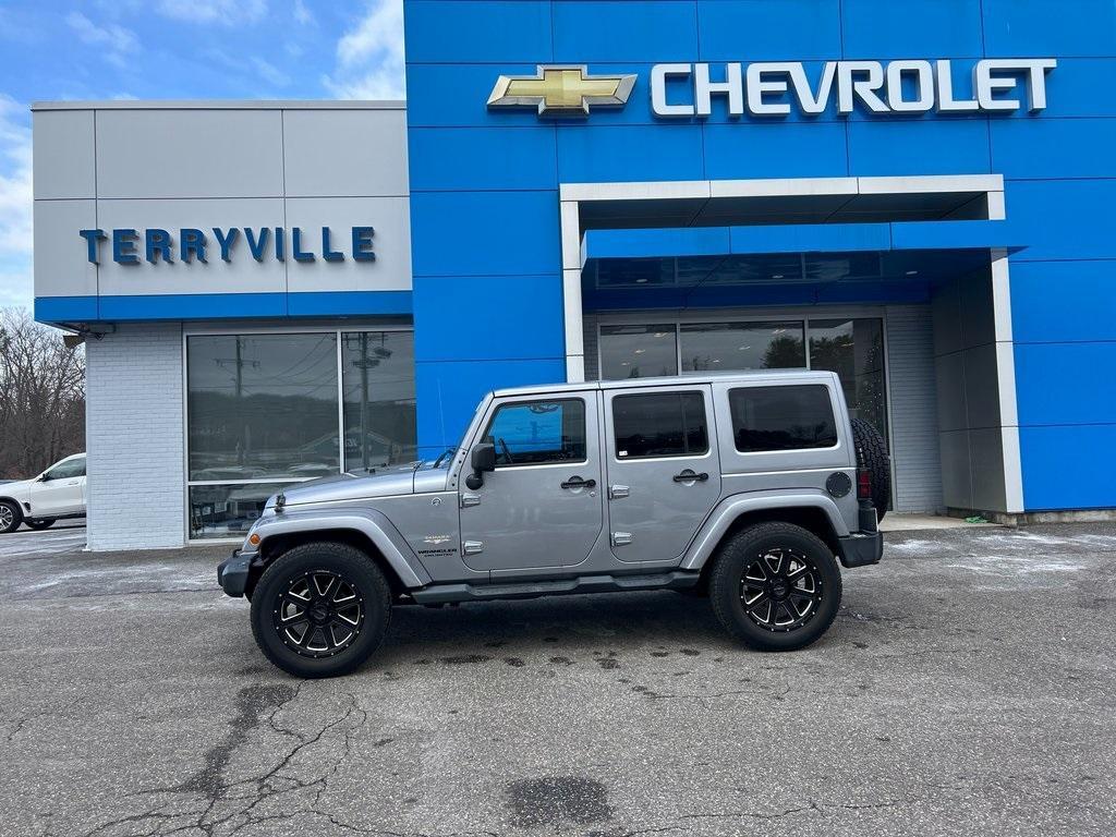 used 2014 Jeep Wrangler Unlimited car, priced at $15,534
