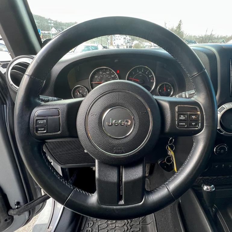 used 2014 Jeep Wrangler Unlimited car, priced at $15,534