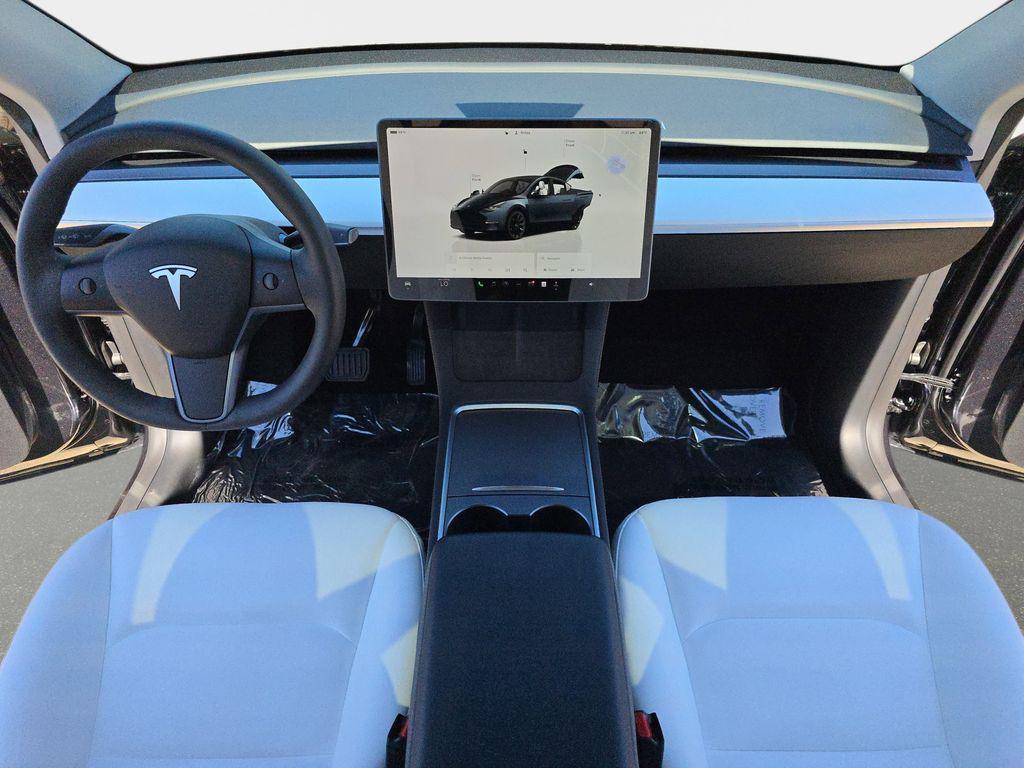 used 2025 Tesla Model Y car, priced at $40,499