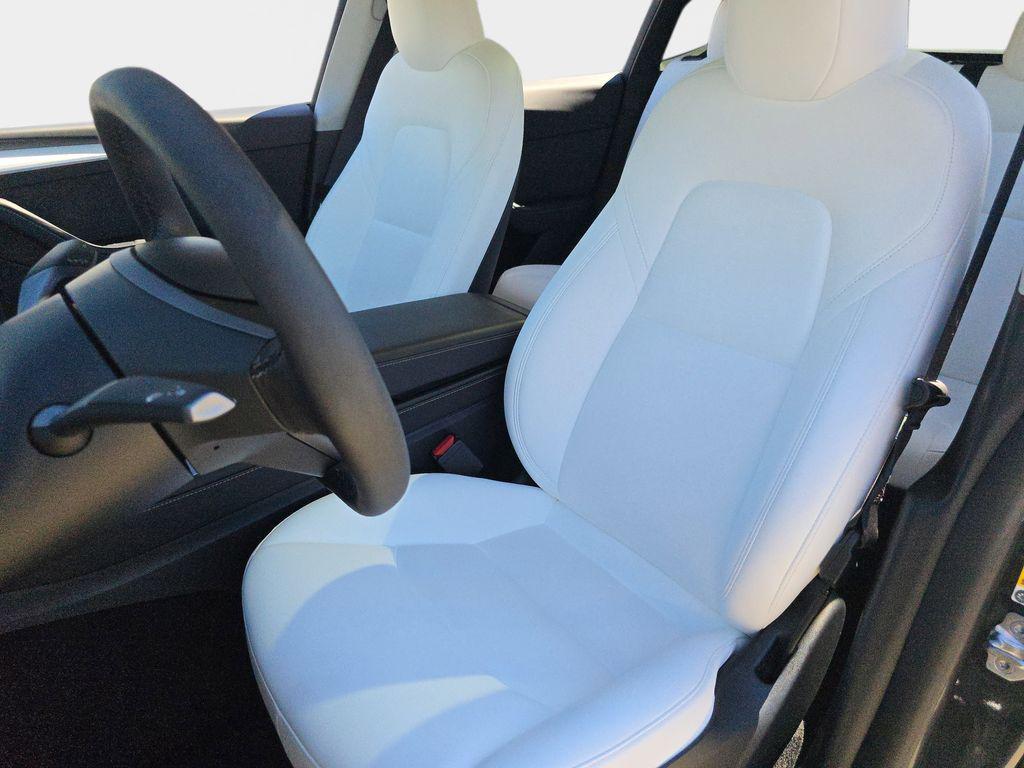 used 2025 Tesla Model Y car, priced at $40,499