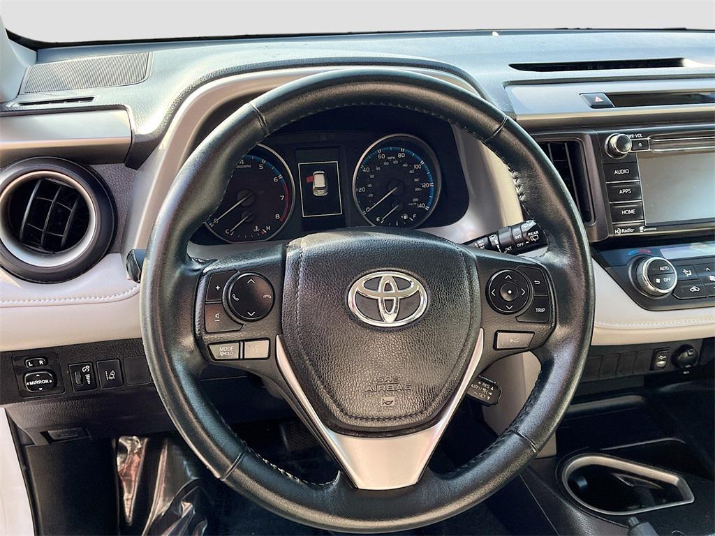 used 2018 Toyota RAV4 car, priced at $20,000