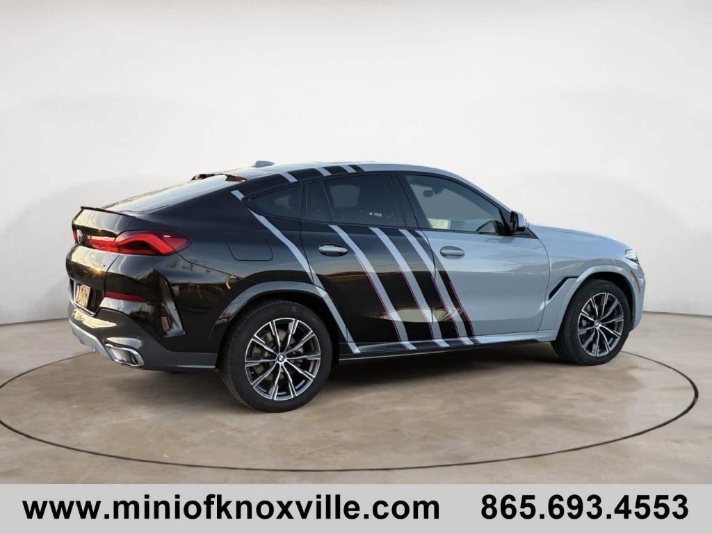 used 2024 BMW X6 car, priced at $63,550