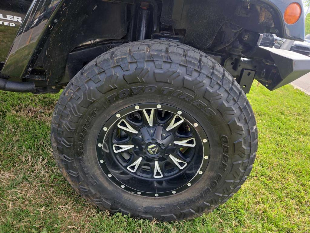 used 2015 Jeep Wrangler Unlimited car, priced at $16,901