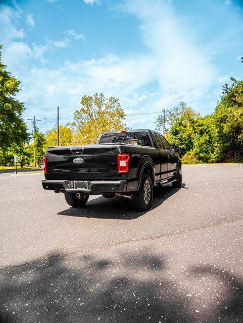 used 2018 Ford F-150 car, priced at $23,744