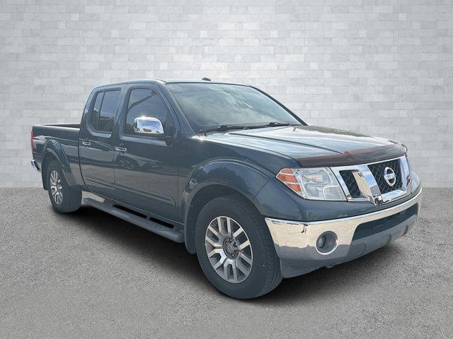 used 2013 Nissan Frontier car, priced at $16,251