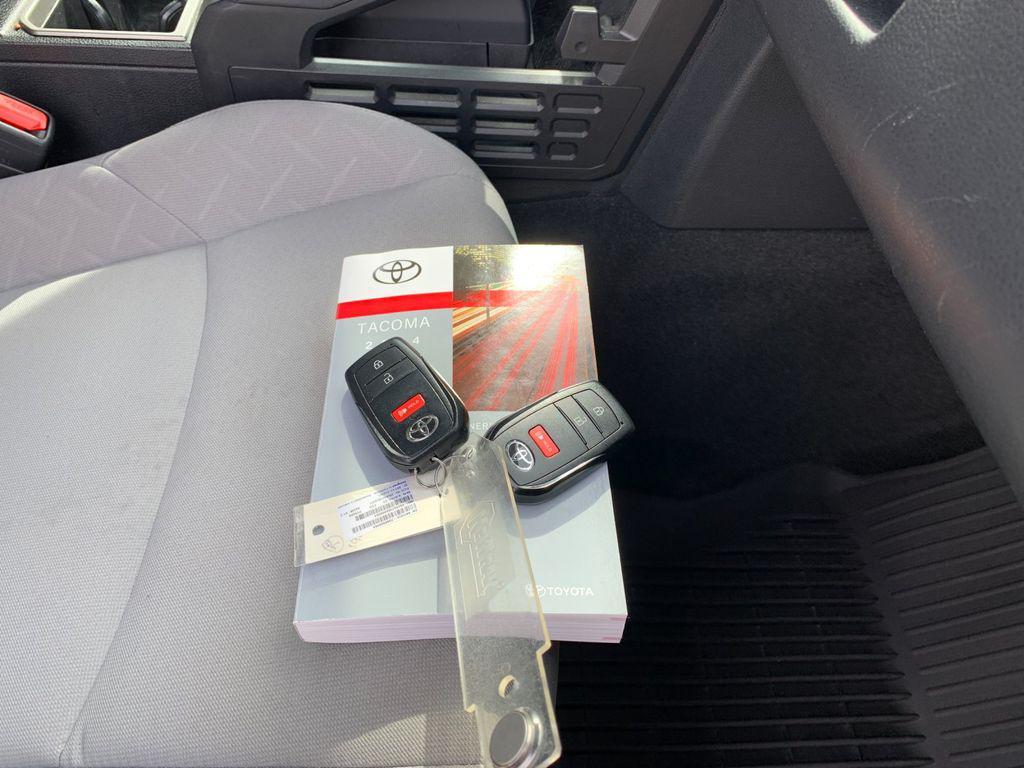 used 2024 Toyota Tacoma car, priced at $35,588