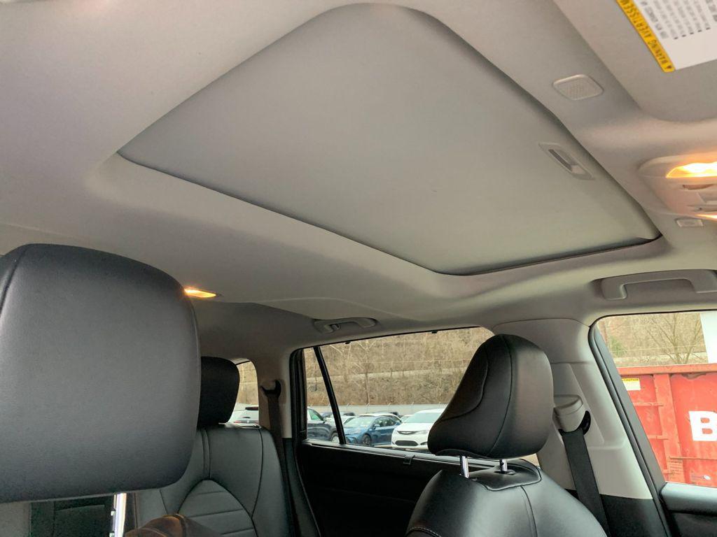 used 2024 Toyota Highlander Hybrid car, priced at $39,988