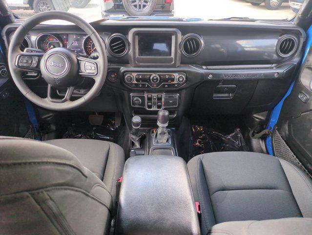 used 2023 Jeep Wrangler car, priced at $32,485