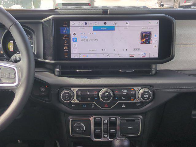 used 2025 Jeep Wrangler 4xe car, priced at $30,998