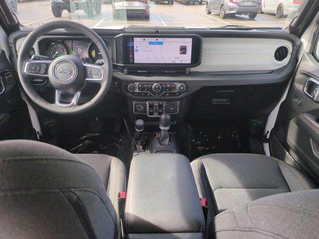 used 2025 Jeep Wrangler 4xe car, priced at $30,998