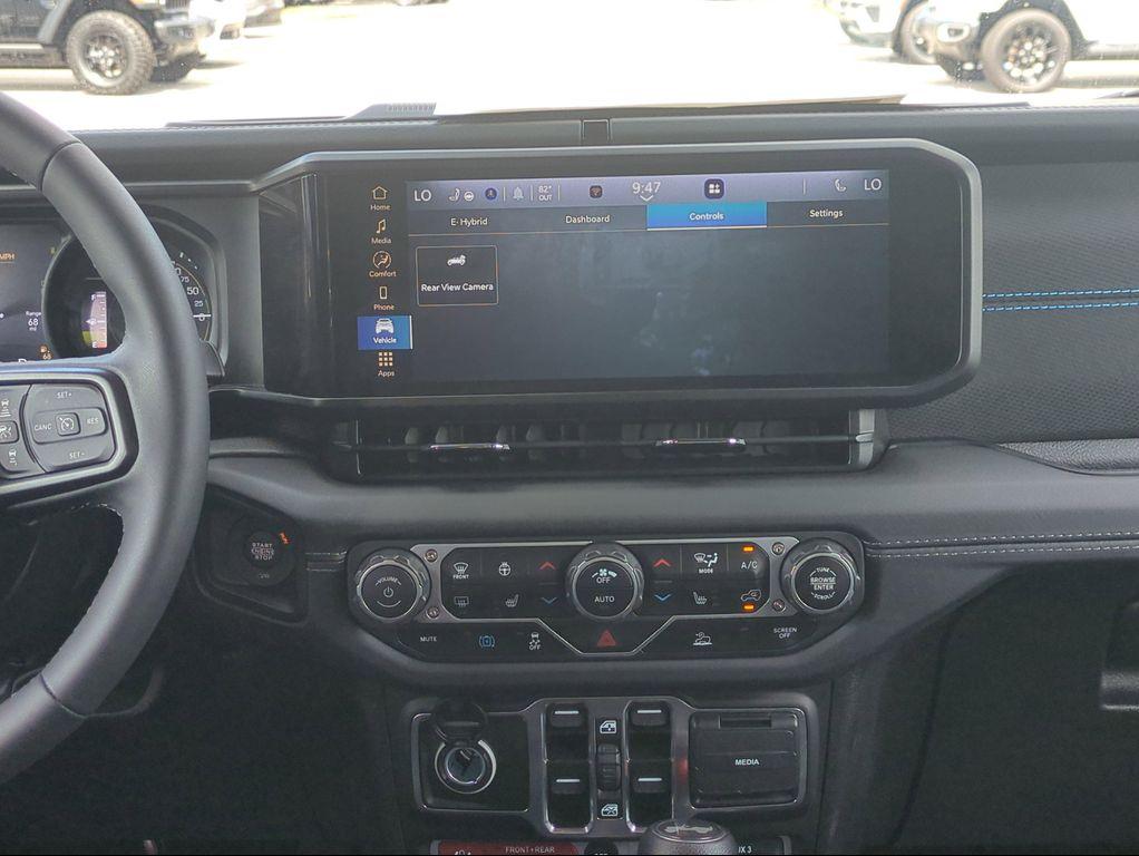 used 2025 Jeep Wrangler 4xe car, priced at $38,244