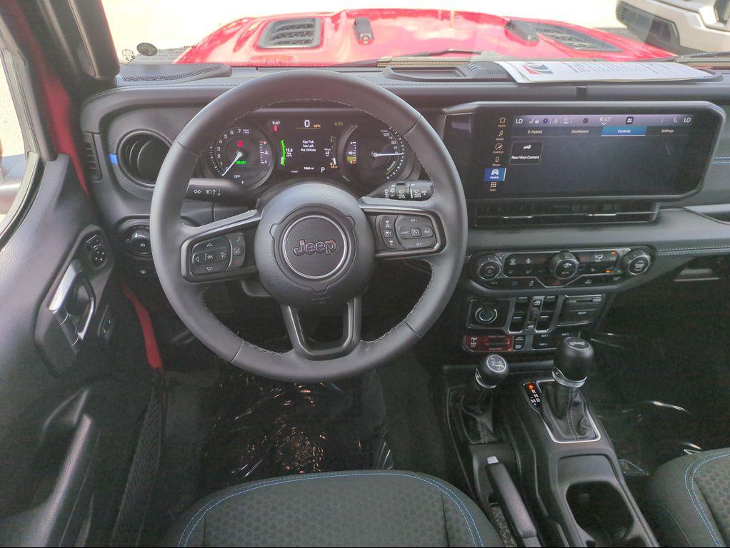 used 2025 Jeep Wrangler 4xe car, priced at $38,244