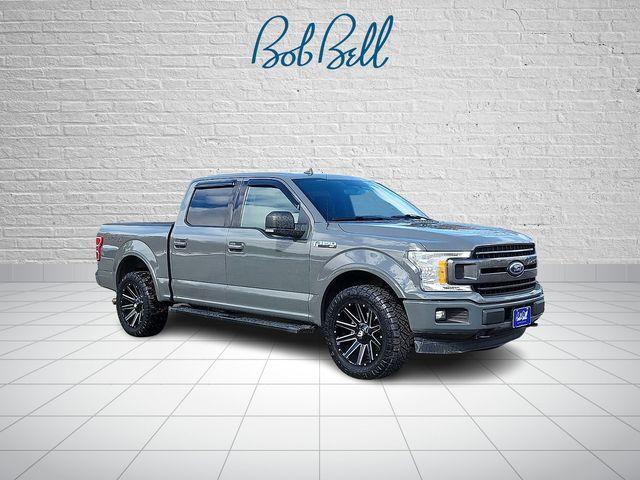 used 2018 Ford F-150 car, priced at $23,213
