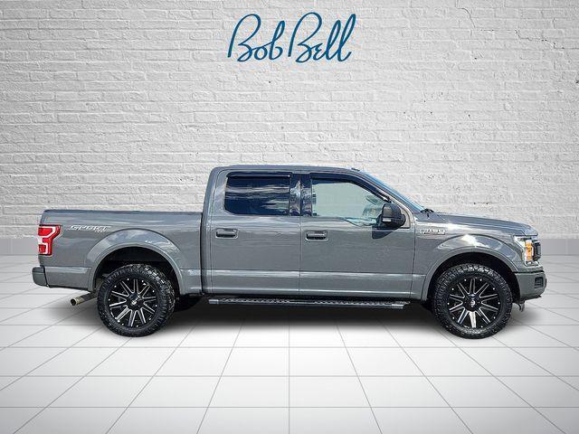 used 2018 Ford F-150 car, priced at $23,213