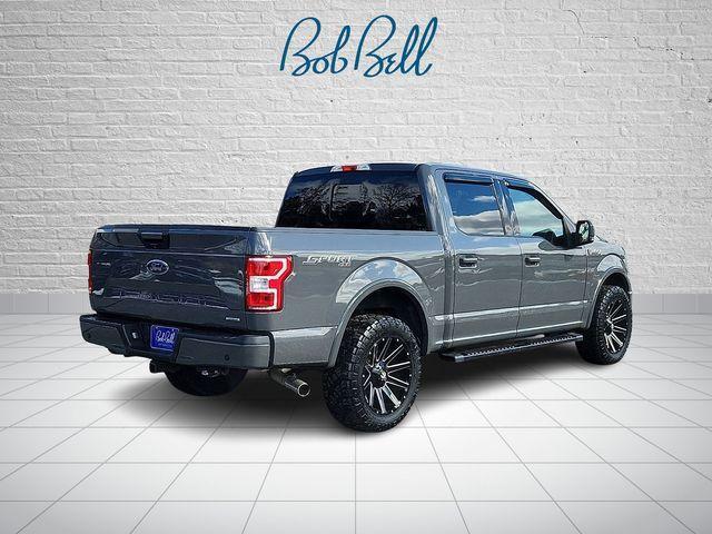 used 2018 Ford F-150 car, priced at $23,213