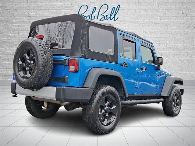 used 2015 Jeep Wrangler Unlimited car, priced at $15,591